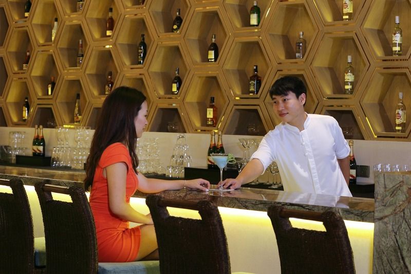 วินด์แฮม แกรนด์พลาซ่า รอยัล ไห่นานหลงมูเบย์ Hotel Ledong ภายนอก รูปภาพ